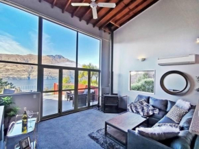 Mountain, lake, sun and this sensational home